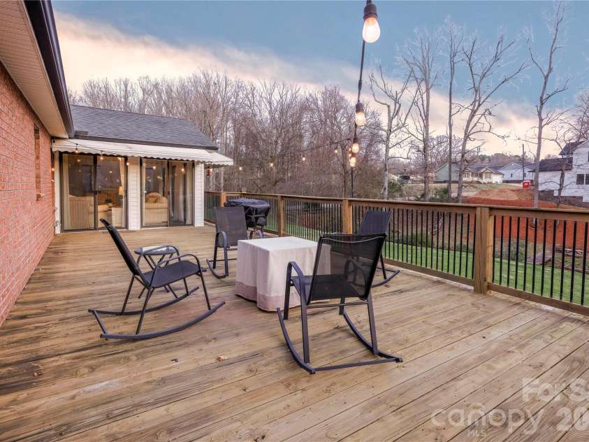 601 Azalea Lane, China Grove, NC 28023.  MLS# CAR4353505, YatesRealty ID 9473. Massive deck for entertaining or watching the sunset