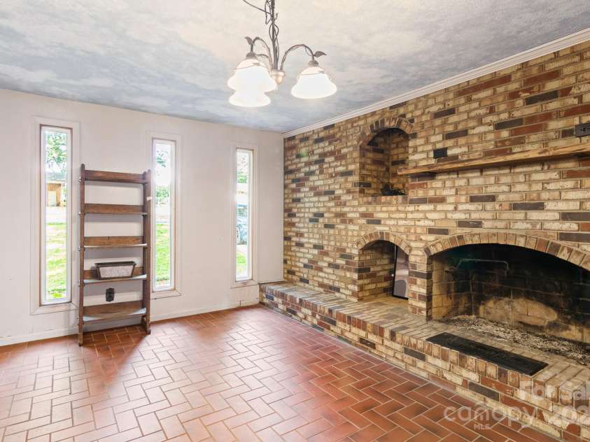 1573 Timberlake Drive, Shelby, NC 28150.  MLS# CAR4173911, YatesRealty ID 9474. ...and a fabulous brick hearth fireplace.