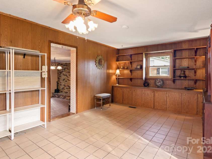 1573 Timberlake Drive, Shelby, NC 28150.  MLS# CAR4173911, YatesRealty ID 9474. Family room includes built-in cabinets and shelves.