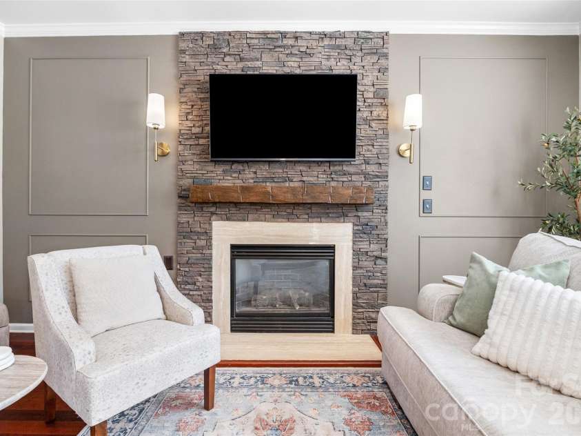 12141 Stone Forest Drive, Pineville, NC 28134.  MLS# CAR4360442, YatesRealty ID 9475. Beautiful accent wall and stone fireplace