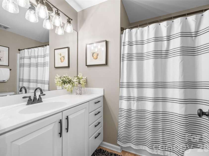 12141 Stone Forest Drive, Pineville, NC 28134.  MLS# CAR4360442, YatesRealty ID 9475. Hall Bathroom