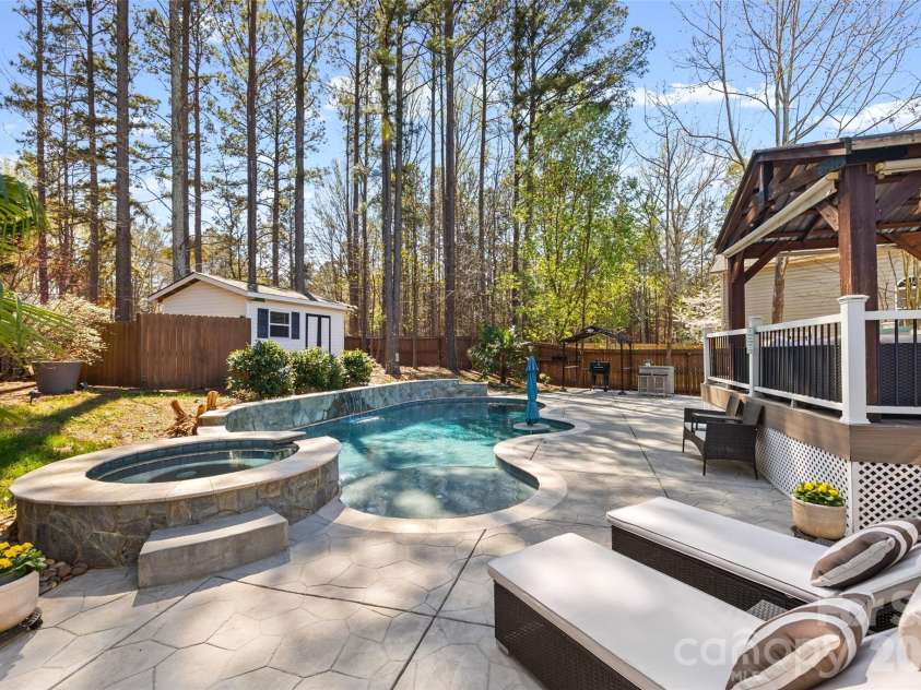 12141 Stone Forest Drive, Pineville, NC 28134.  MLS# CAR4360442, YatesRealty ID 9475. Private Backyard