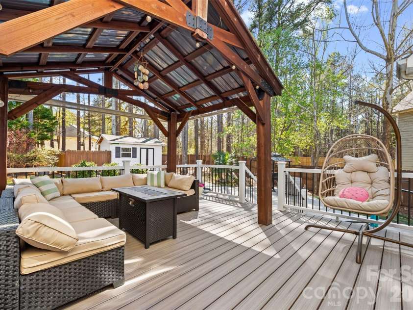 12141 Stone Forest Drive, Pineville, NC 28134.  MLS# CAR4360442, YatesRealty ID 9475. Trex Deck 