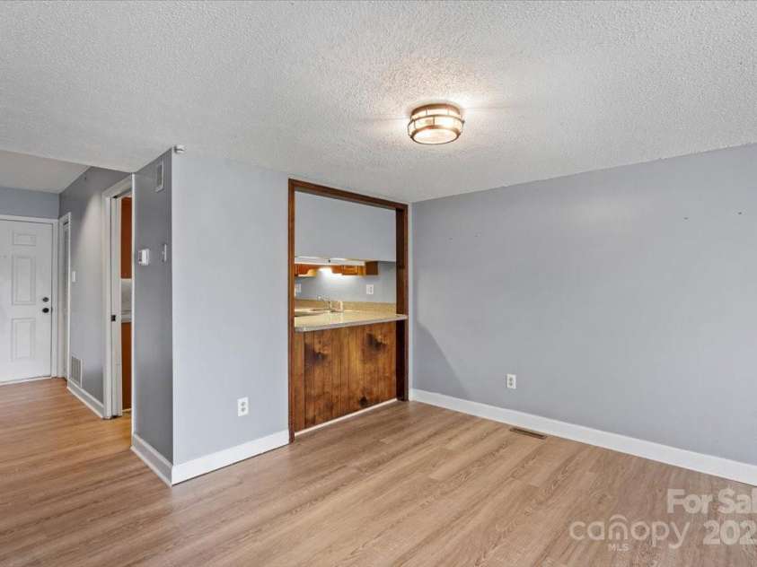 5190 Corbin Lane, Hickory, NC 28601.  MLS# CAR4215857, YatesRealty ID 9477. Dining & Living Room