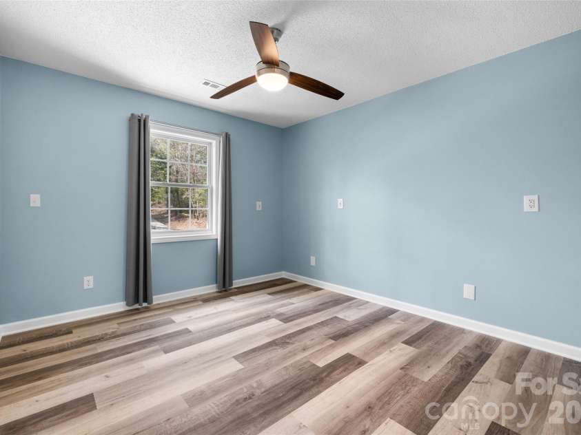 5980 Quarter Mile Road, Clover, SC 29710.  MLS# CAR4358469, YatesRealty ID 9482. Upstairs Bedroom