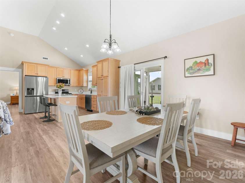 432 Sassafras Drive, Hendersonville, NC 28739.  MLS# CAR4366185, YatesRealty ID 9484. Dining Area – Defined dining space with direct access to the back deck, perfect for indoor-outdoor living and casual meals or hosting.