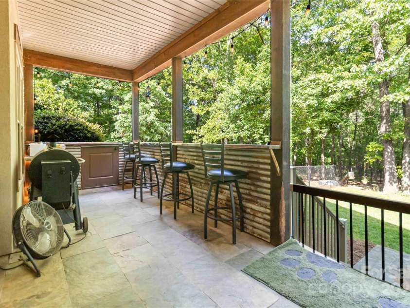 4925 Pageland Highway, Monroe, NC 28112.  MLS# CAR4245962, YatesRealty ID 9484. Covered back porch