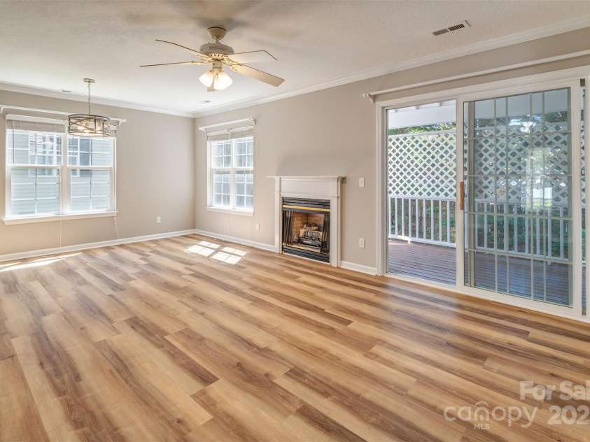 9 Willoughby Run Drive, Asheville, NC 28803.  MLS# CAR4242176, YatesRealty ID 9485. Living room with gas fire place