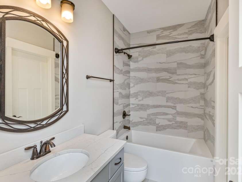 185 Sports Village Drive, Hendersonville, NC 28739.  MLS# CAR4247401, YatesRealty ID 9486. Guest Bathroom