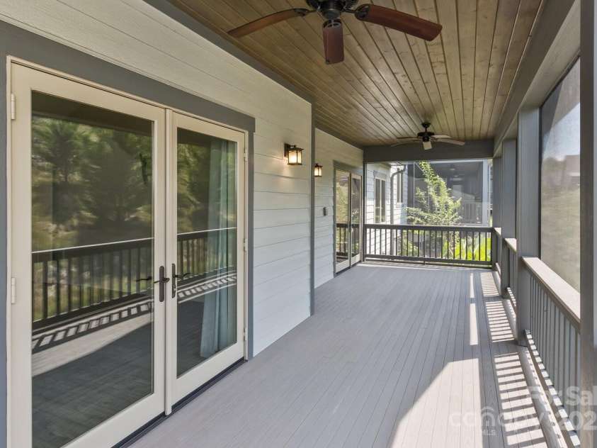 185 Sports Village Drive, Hendersonville, NC 28739.  MLS# CAR4247401, YatesRealty ID 9486. Large Screened in Deck