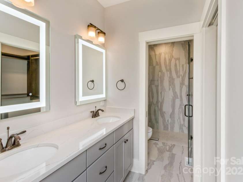 185 Sports Village Drive, Hendersonville, NC 28739.  MLS# CAR4247401, YatesRealty ID 9486. Lighted BR Mirrors