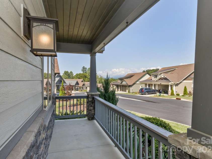 185 Sports Village Drive, Hendersonville, NC 28739.  MLS# CAR4247401, YatesRealty ID 9486. Mountain View Front Porch