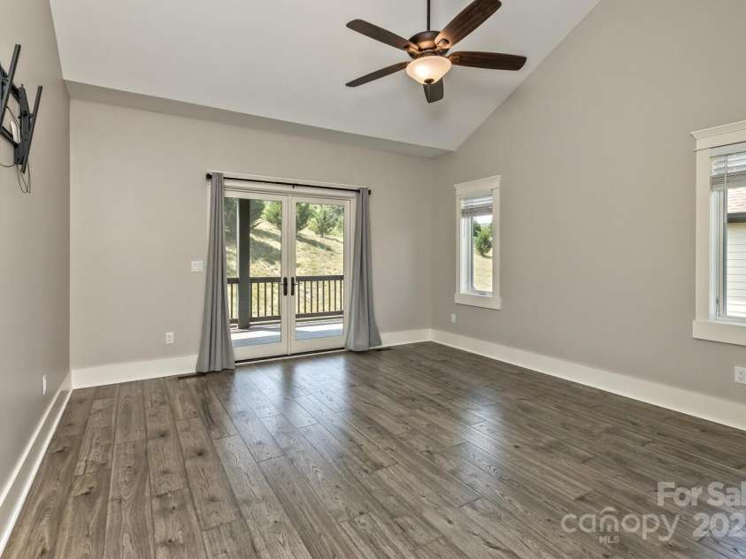 185 Sports Village Drive, Hendersonville, NC 28739.  MLS# CAR4247401, YatesRealty ID 9486. Primary BR with new floors