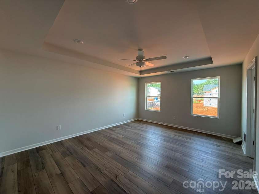 1227 Bansal Drive, Charlotte, NC 28215.  MLS# CAR4365795, YatesRealty ID 9487. Spacious Primary Bedroom with Boxed Ceiling