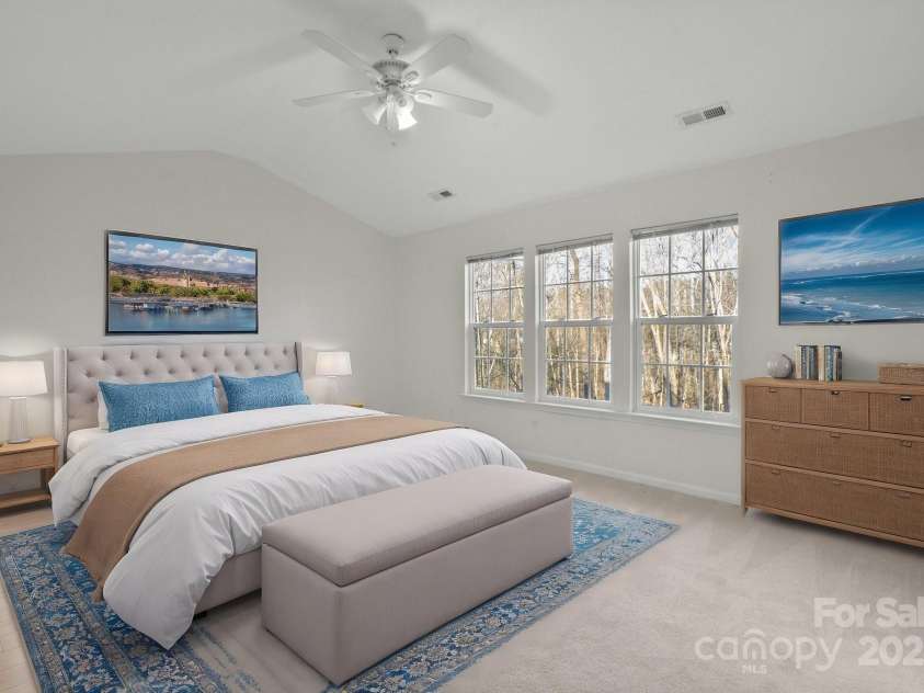 13443 Norseman Lane, Huntersville, NC 28078.  MLS# CAR4218329, YatesRealty ID 949. Primary Bedroom beautifully staged (virtually)