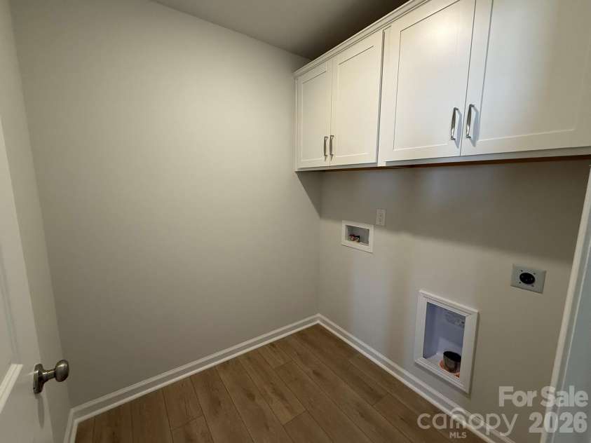 1231 Bansal Drive, Charlotte, NC 28215.  MLS# CAR4363373, YatesRealty ID 9491. Laundry Room with Additional Cabinets