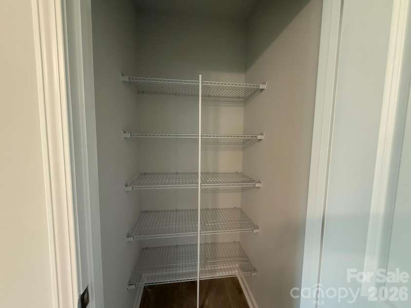 1231 Bansal Drive, Charlotte, NC 28215.  MLS# CAR4363373, YatesRealty ID 9491. Spacious Linen Closet in Primary Bathroom