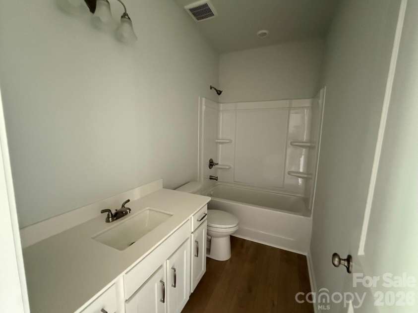 1305 Bansal Drive, Charlotte, NC 28215.  MLS# CAR4360795, YatesRealty ID 9492. Full Guest Bathroom