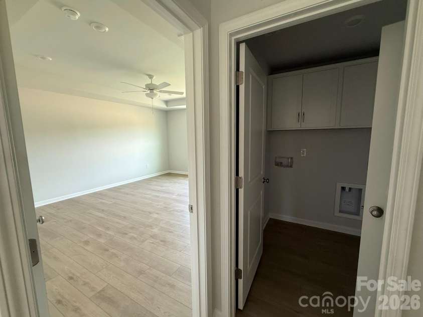 1305 Bansal Drive, Charlotte, NC 28215.  MLS# CAR4360795, YatesRealty ID 9492. Primary Bedroom and Laundry Room are conveniently located