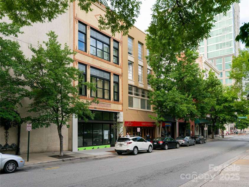 35 Patton Avenue, Asheville, NC 28801.  MLS# CAR4299187, YatesRealty ID 9493. Entrance to 35 Patton with keypad security is door to the left of the well-loved Lobster Trap restaurant