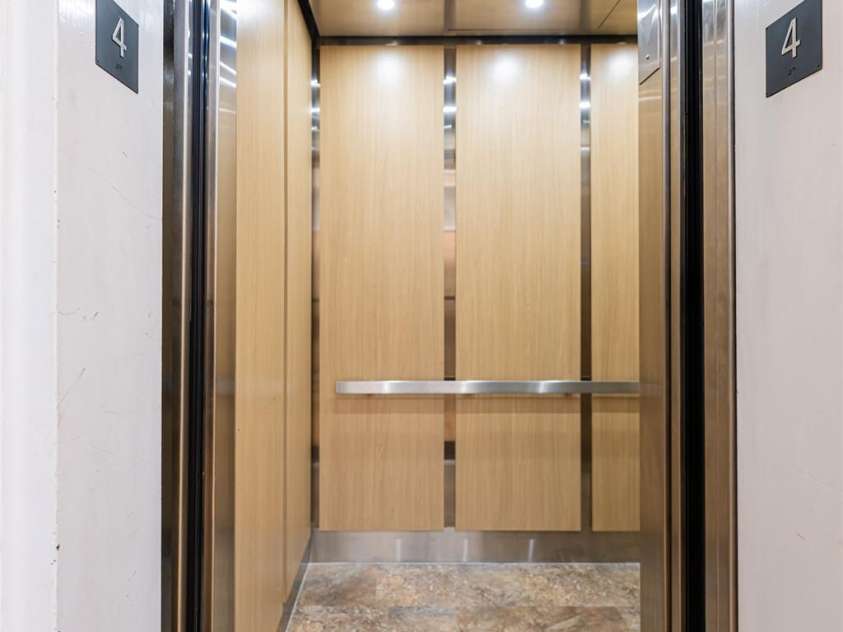 35 Patton Avenue, Asheville, NC 28801.  MLS# CAR4299187, YatesRealty ID 9493. Newly restored elevator in 35 Patton