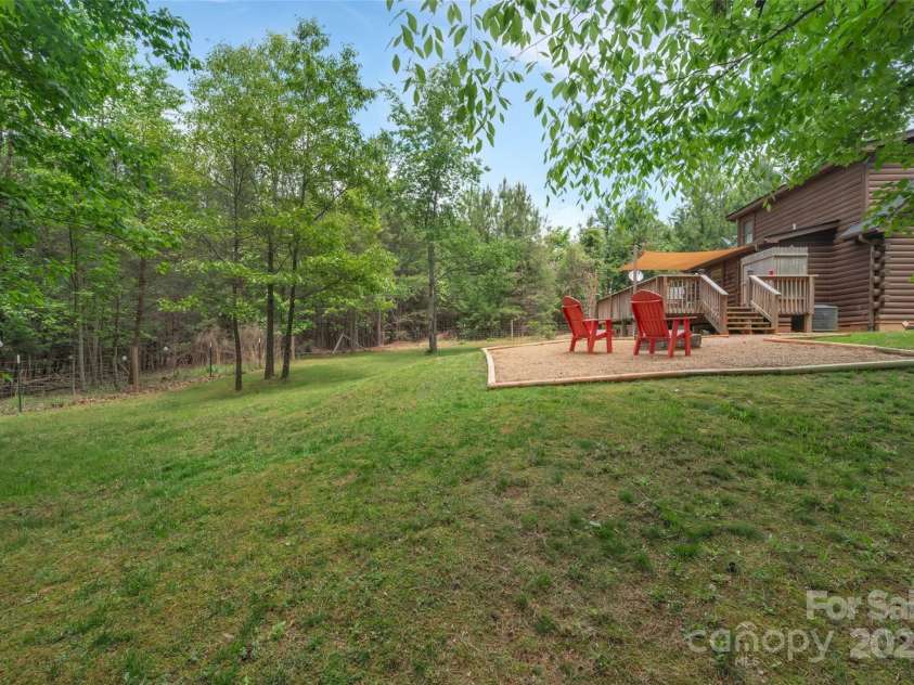 381 Dakota Drive, Rutherfordton, NC 28139.  MLS# CAR4250490, YatesRealty ID 9494. Side Yard with Outdoor Shower