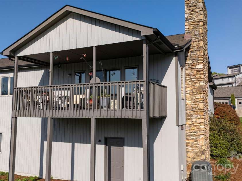 204 Kyfields None, Weaverville, NC 28787.  MLS# CAR4252344, YatesRealty ID 9496. Covered Back Deck. Entrance into lower storage area.
