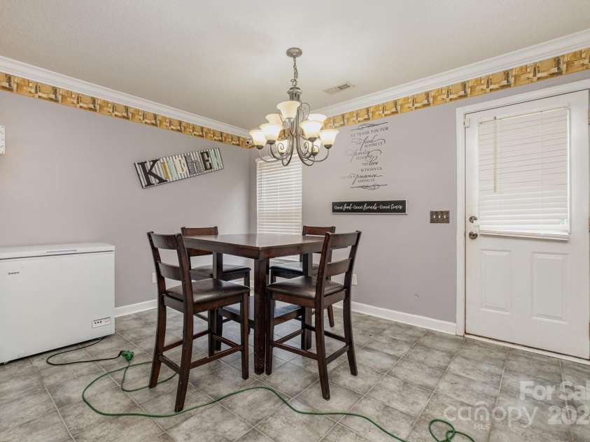 1820 Oakdale Green Drive, Charlotte, NC 28216.  MLS# CAR4141709, YatesRealty ID 950. Dining Area/Back Door