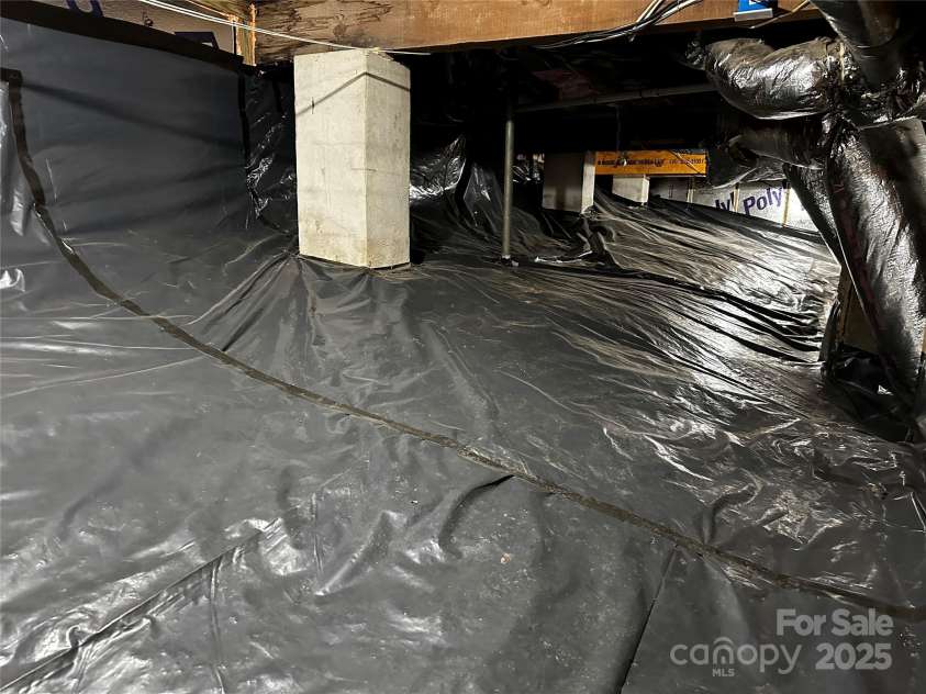 135 Clubhouse Road, Beech Mountain, NC 28604.  MLS# CAR4253056, YatesRealty ID 9507. Crawl Space sealed 2021