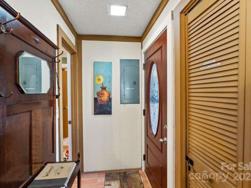 135 Clubhouse Road, Beech Mountain, NC 28604.  MLS# CAR4253056, YatesRealty ID 9507. Entry hall