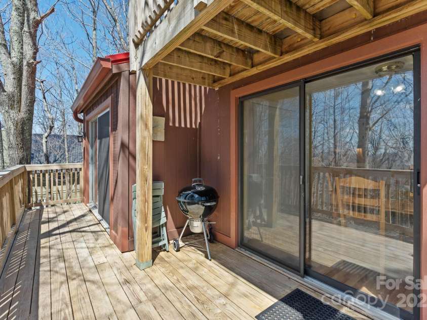 135 Clubhouse Road, Beech Mountain, NC 28604.  MLS# CAR4253056, YatesRealty ID 9507. Rear deck great for entertaining or jsut relaxing!