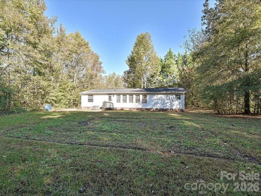 190 Ridge Creek Drive, Troutman, NC 28166.  MLS# CAR4364865, YatesRealty ID 9512. Huge backyard ready for all activities.  