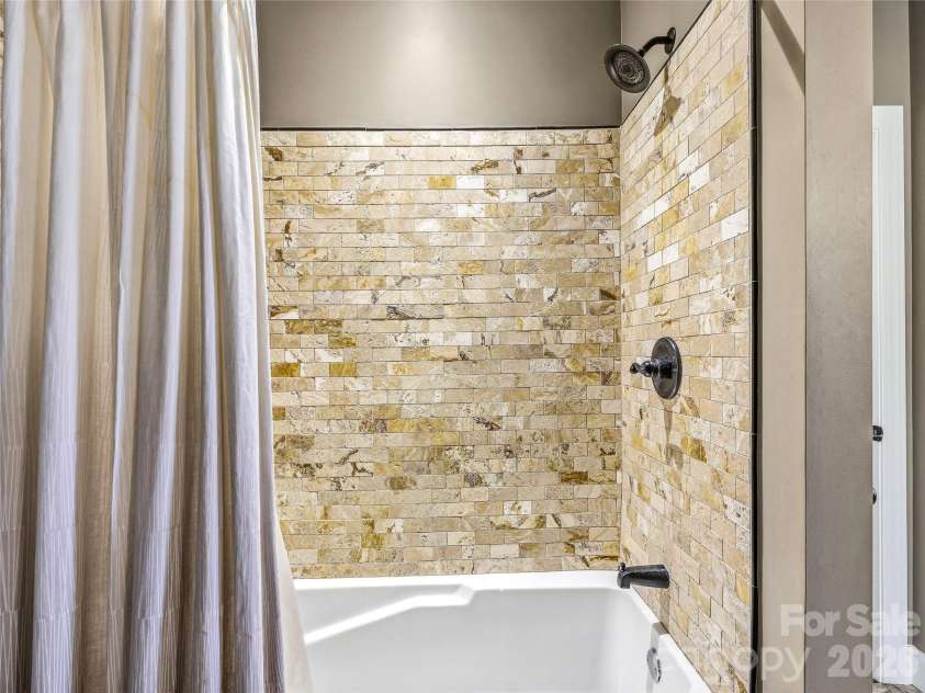 402 Holmstead Drive, Lake Lure, NC 28746.  MLS# CAR4367214, YatesRealty ID 9517. 