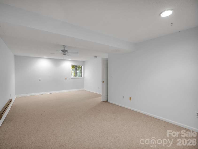 335 Melrose Avenue, Tryon, NC 28782.  MLS# CAR4417394, YatesRealty ID 9529. Additional lower level Bedroom