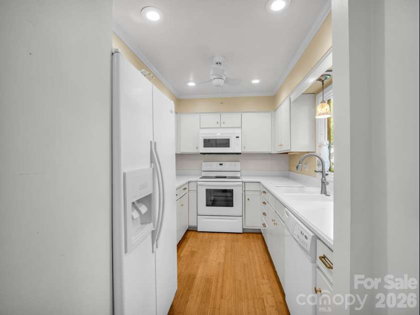 335 Melrose Avenue, Tryon, NC 28782.  MLS# CAR4417394, YatesRealty ID 9529. Bamboo flooring -Main level kitchen