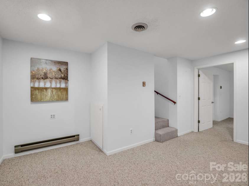 335 Melrose Avenue, Tryon, NC 28782.  MLS# CAR4417394, YatesRealty ID 9529. Baseboard electric is supplemental heat