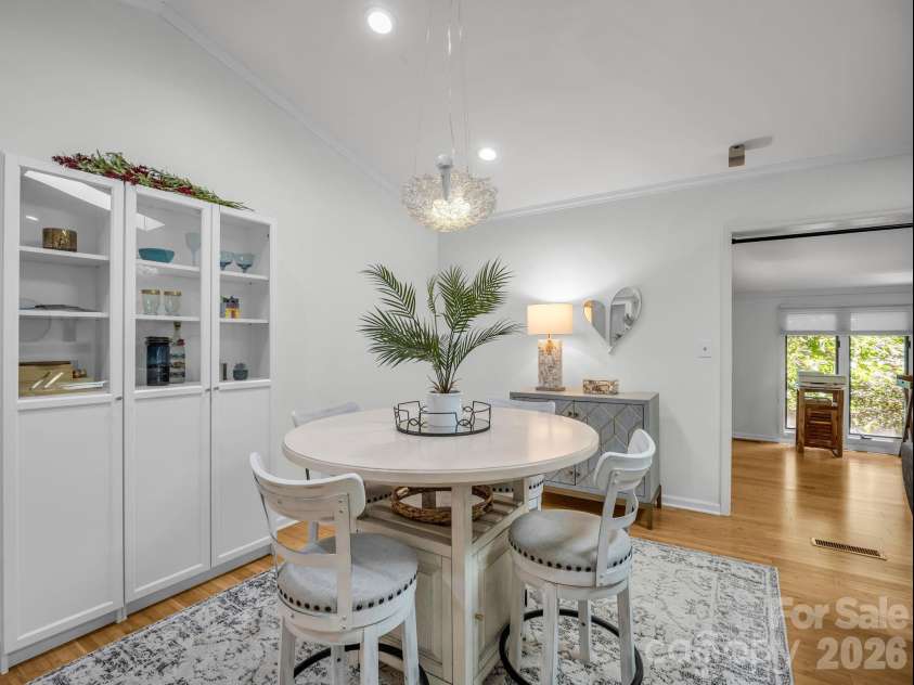335 Melrose Avenue, Tryon, NC 28782.  MLS# CAR4417394, YatesRealty ID 9529. Dining Area with view to rear
