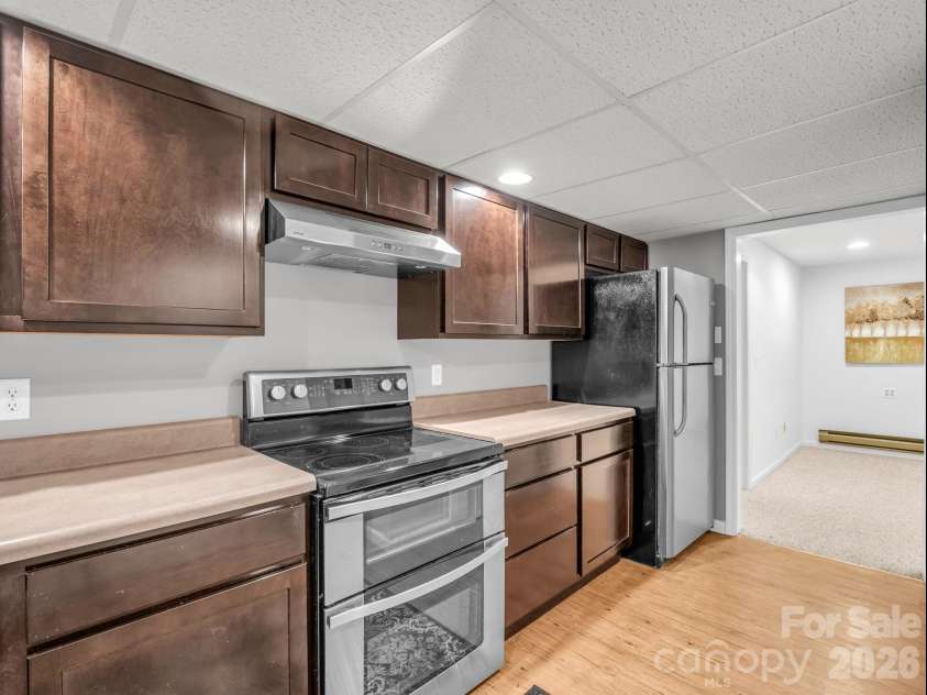 335 Melrose Avenue, Tryon, NC 28782.  MLS# CAR4417394, YatesRealty ID 9529. Double Oven, Luxury vinyl flooring