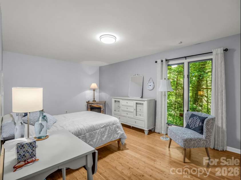 335 Melrose Avenue, Tryon, NC 28782.  MLS# CAR4417394, YatesRealty ID 9529. Primary bedroom- Curtains included