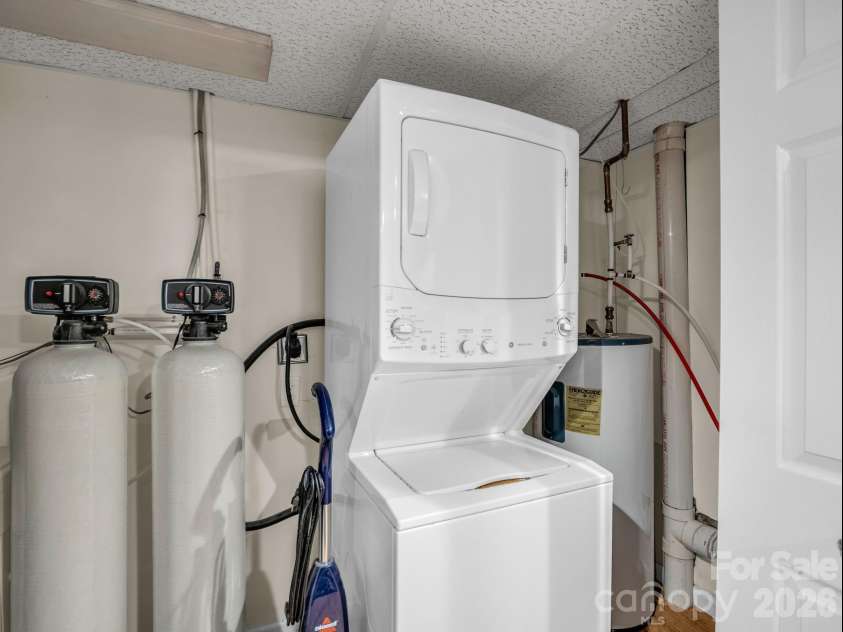 335 Melrose Avenue, Tryon, NC 28782.  MLS# CAR4417394, YatesRealty ID 9529. Stackable washer/dryer & water treatment system