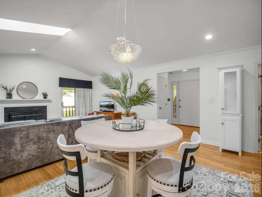 335 Melrose Avenue, Tryon, NC 28782.  MLS# CAR4417394, YatesRealty ID 9529. Wood-burning fireplace for those chilly evenings
