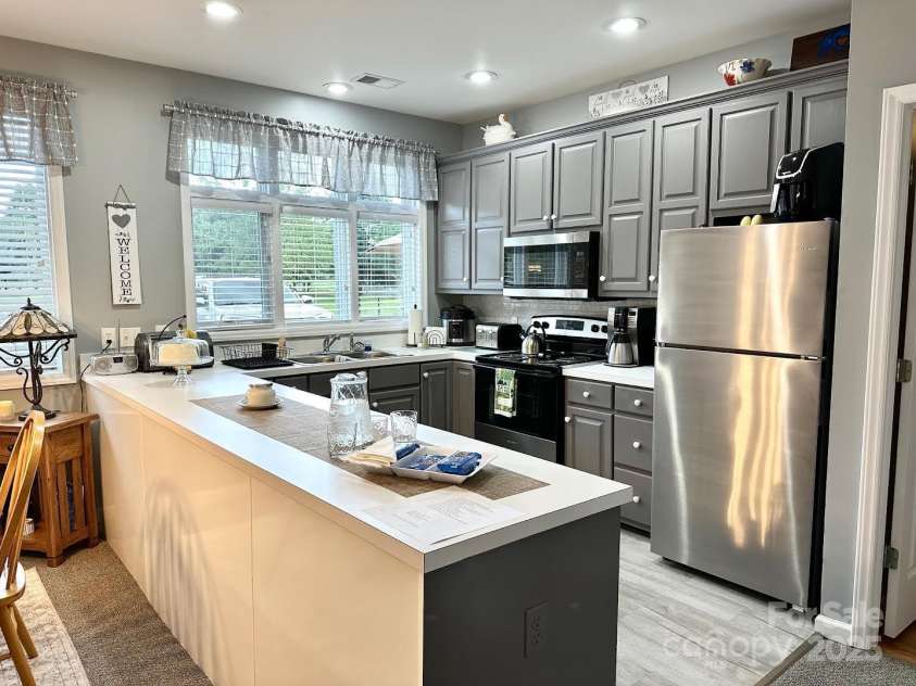 495 Landing Drive, Jefferson, NC 28640.  MLS# CAR4239689, YatesRealty ID 9533. 