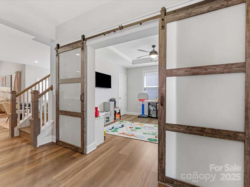 5013 Watercrest Trail, Belmont, NC 28012.  MLS# CAR4234154, YatesRealty ID 9534. Barn doors at flex room