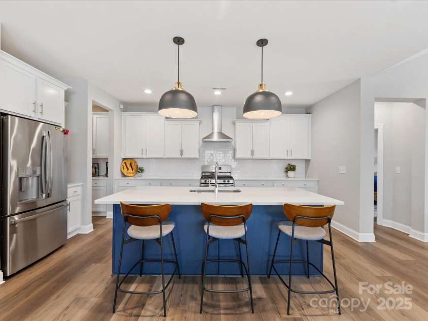 5013 Watercrest Trail, Belmont, NC 28012.  MLS# CAR4234154, YatesRealty ID 9534. Custom Pendant lights over island