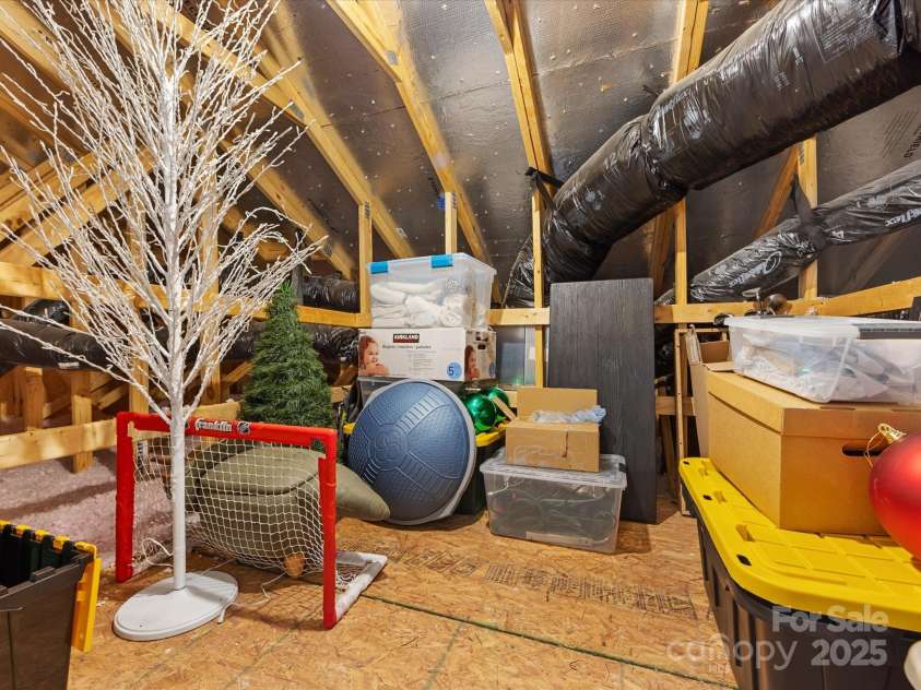 5013 Watercrest Trail, Belmont, NC 28012.  MLS# CAR4234154, YatesRealty ID 9534. Easily accessible walk in  attic storage