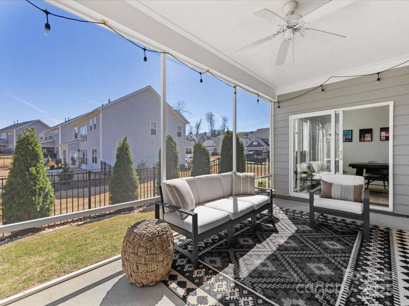 5013 Watercrest Trail, Belmont, NC 28012.  MLS# CAR4234154, YatesRealty ID 9534. Screened porch offers additional outdoor living space