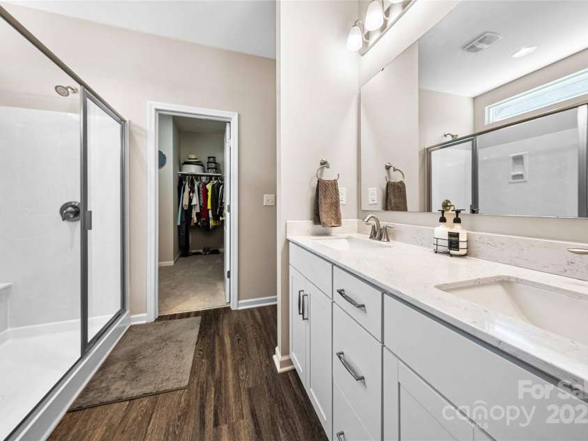 2914 Hiddenbrook Way, Indian Land, SC 29707.  MLS# CAR4227990, YatesRealty ID 9536. Extended shower and dual vanities