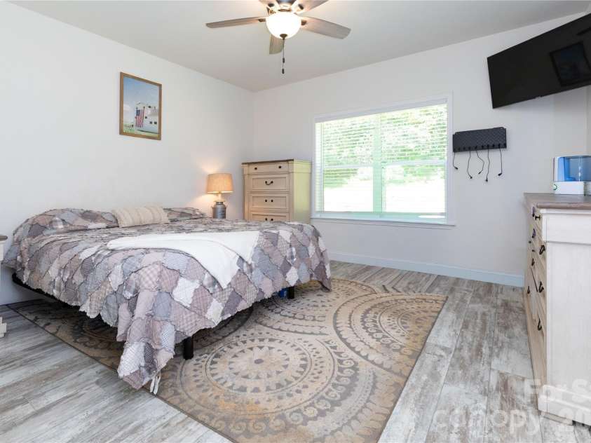 653 Mag Sluder Road, Alexander, NC 28701.  MLS# CAR4299475, YatesRealty ID 9536. Primary bedroom