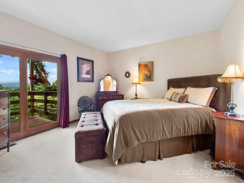 305 Piney Mountain Drive, Asheville, NC 28805.  MLS# CAR4286692, YatesRealty ID 9539. Main bedroom with mountain views!