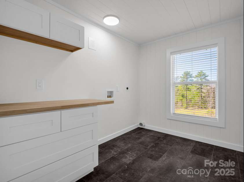 3531 Big Level Road, Mill Spring, NC 28756.  MLS# CAR4234661, YatesRealty ID 9546. Laundry Room